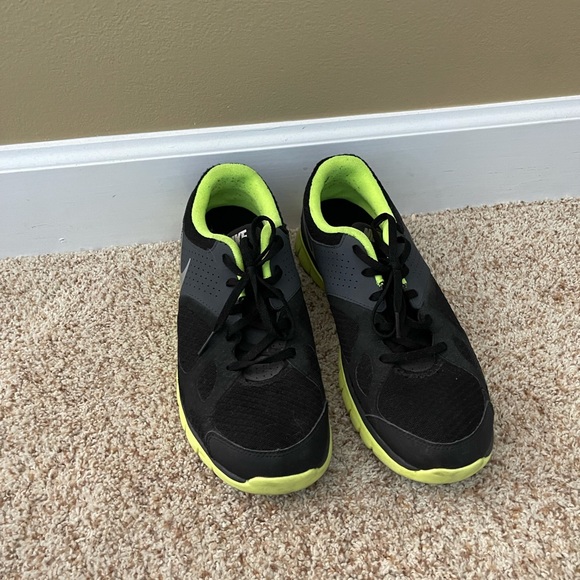 nike black and neon green sneakers